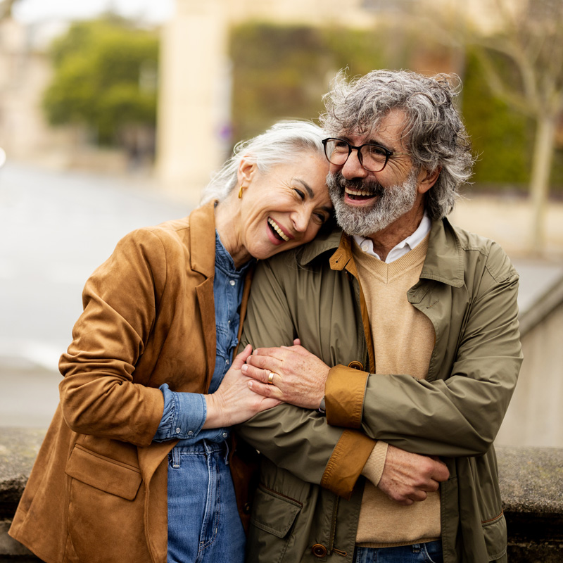 a couple smiling and happy